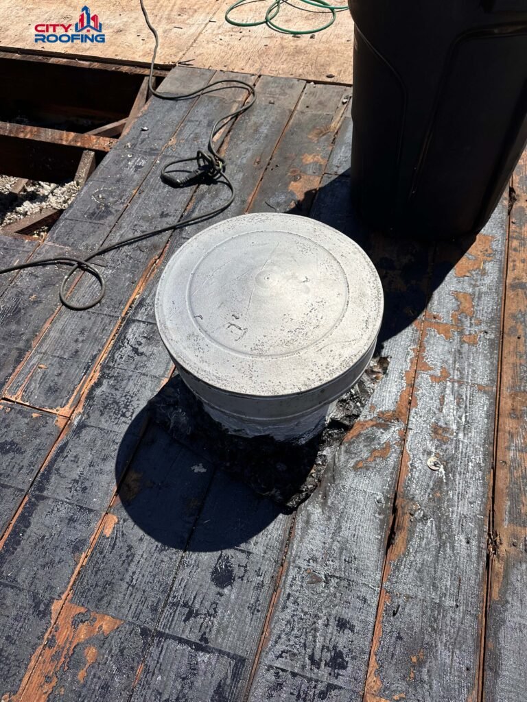 fixing a leak on a flat roof City Roofing Company NYC | City Roofing Company NYC